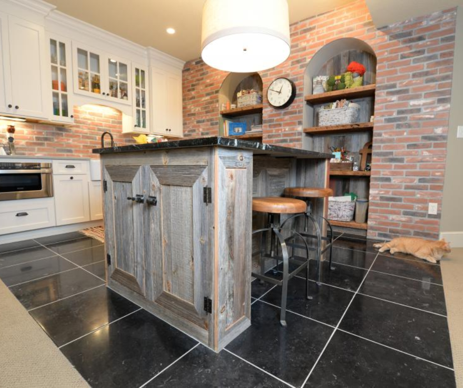 Reclaimed wood kitchen island and cabinetry, adding warmth and sustainability to a modern kitchen.