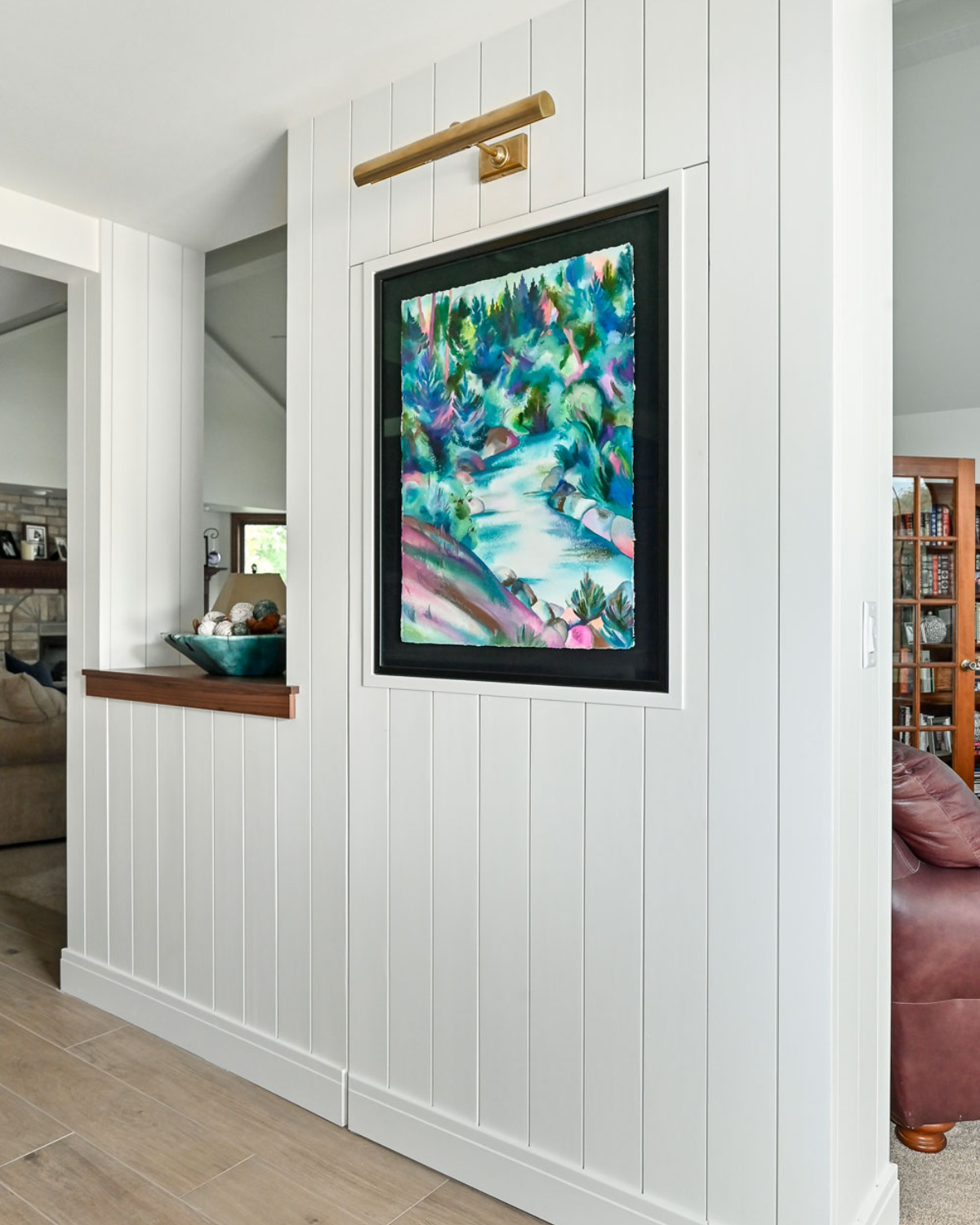 Closed custom blue and white kitchen closet door, maintaining a clean and streamlined appearance.