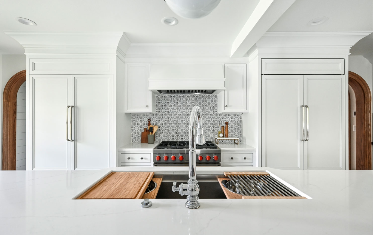 Bright and inviting blue and white kitchen remodel with a cozy breakfast nook and plenty of natural light.