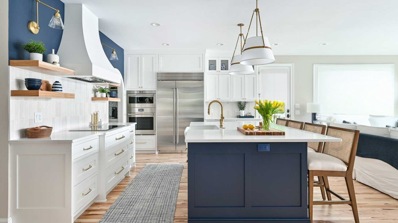 Elegant blue and white kitchen remodel with custom cabinetry and luxury finishes in Sarasota.