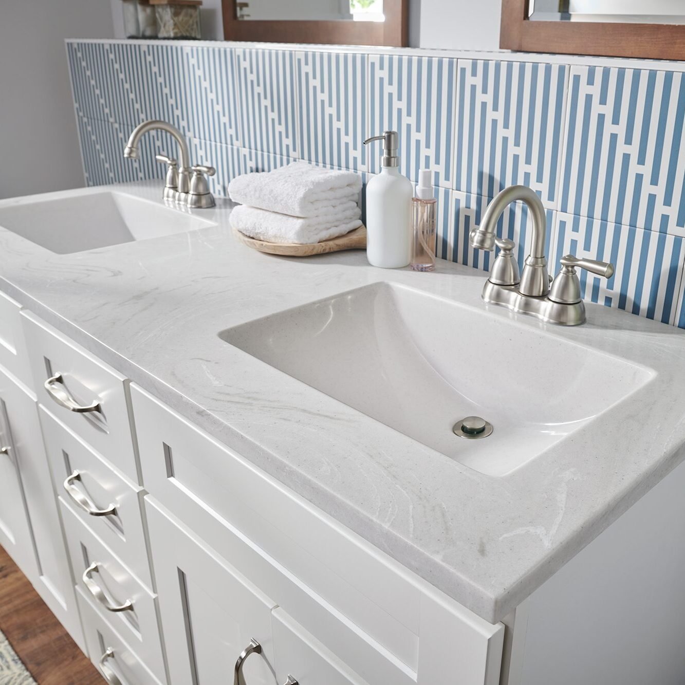 Elegant cultured marble vanity top with a glossy finish in a modern bathroom.