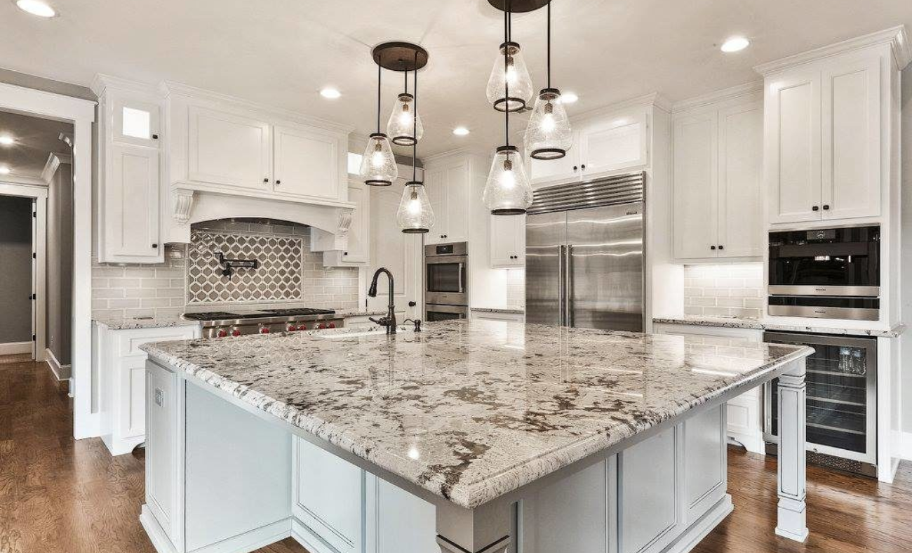 Granite kitchen countertops with a polished finish and unique stone patterns.