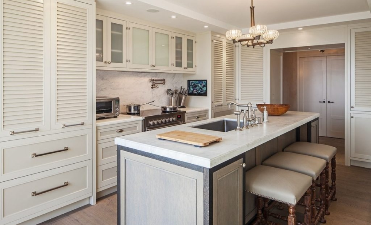 Louvered kitchen cabinets featuring horizontal slats for a distinctive look.