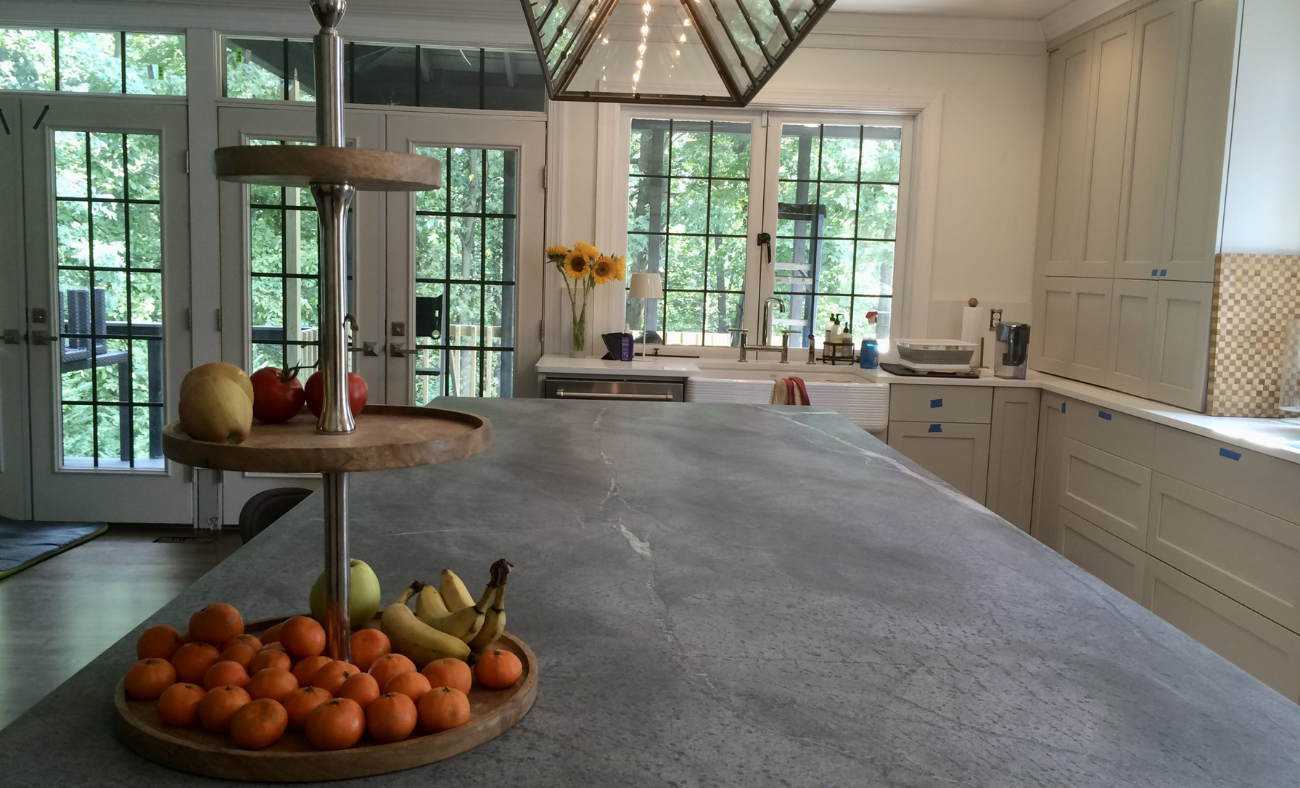 Elegant soapstone countertop with custom kitchen cabinets