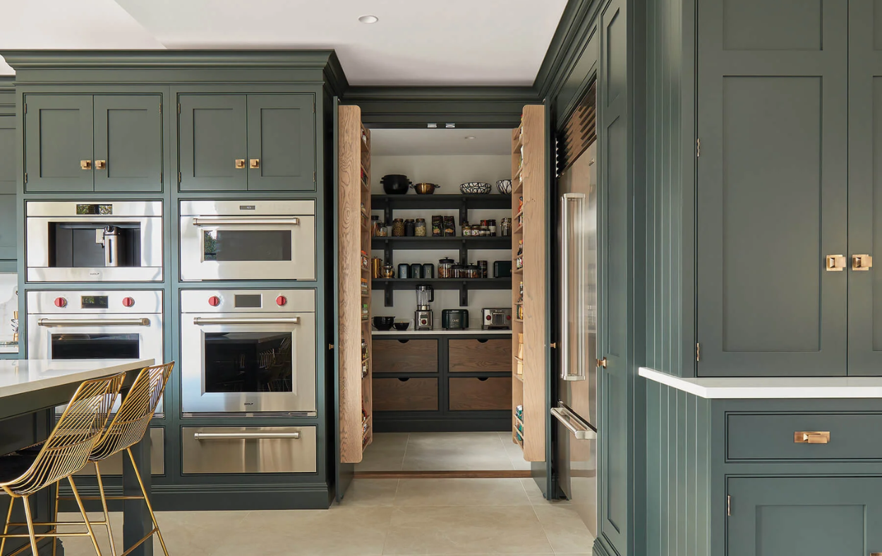 Spacious walk-in pantry with custom shelving and ample storage in a Sarasota kitchen remodel.